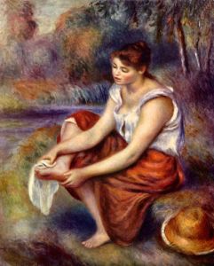 Girl dryes her feet
